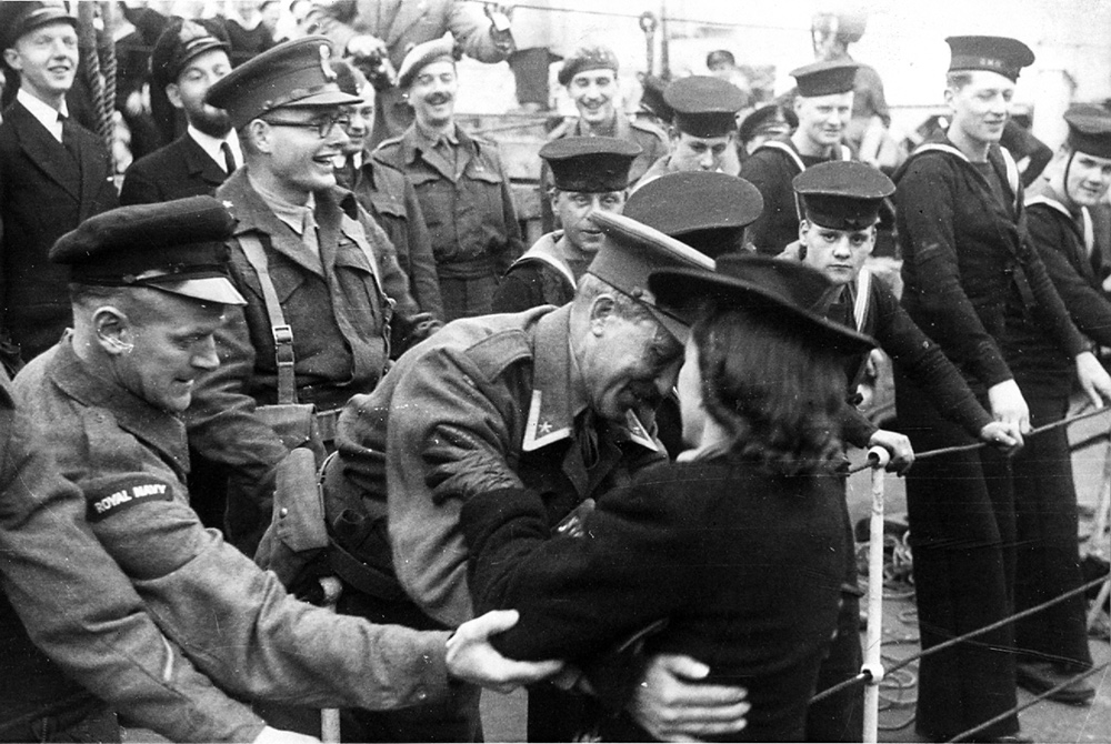 Greets his wife